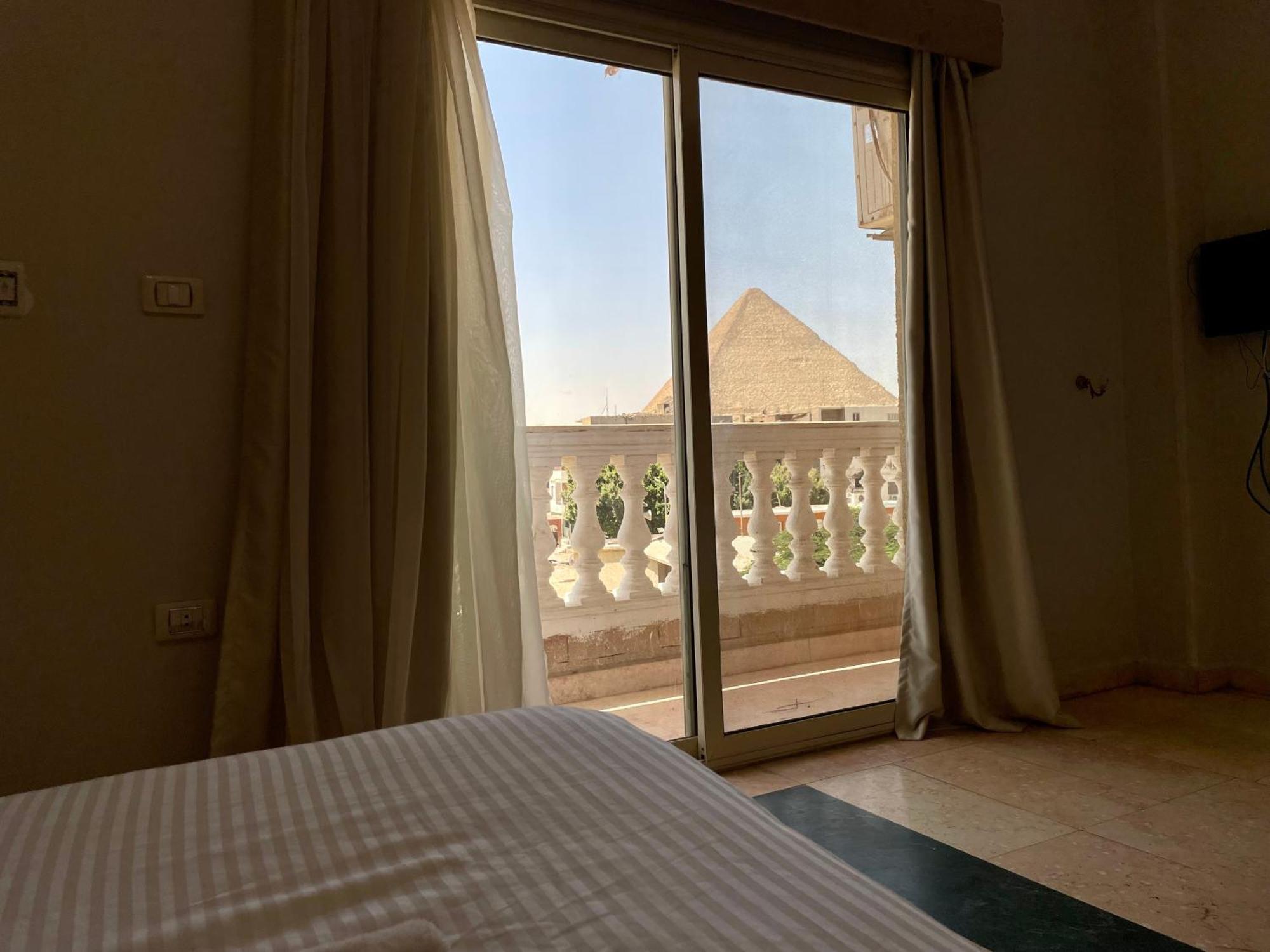 Pyramids Homeland Inn Кайро Екстериор снимка