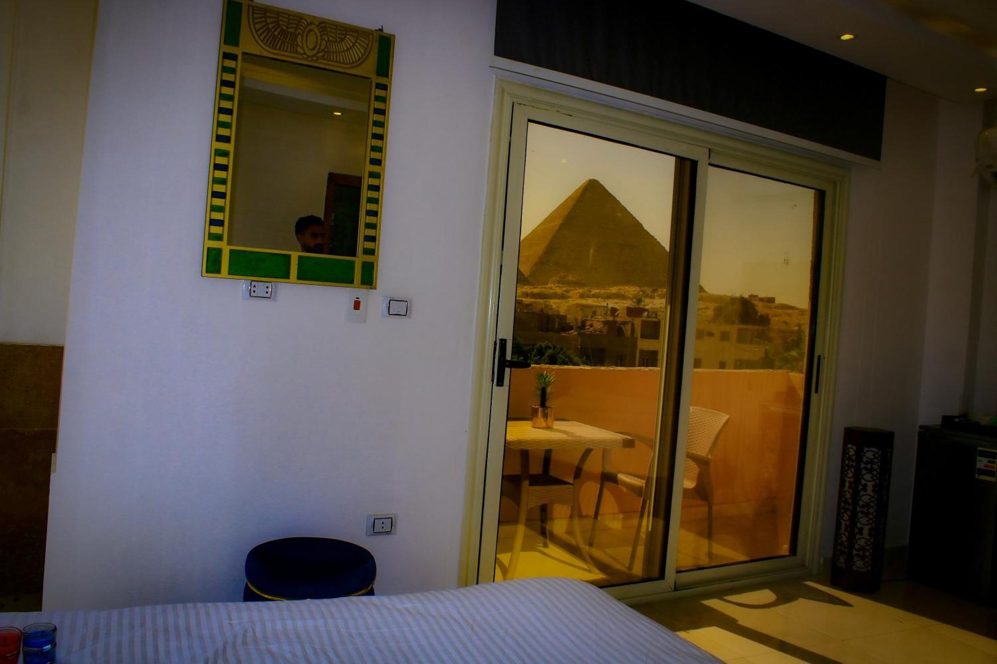 Pyramids Homeland Inn Кайро Стая снимка